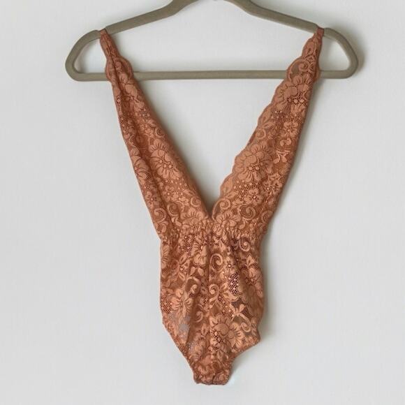 We Are HAH Other - We Are HAH Comin in Haht Lace one-piece bodysuit Sz XS in Pink Nude color